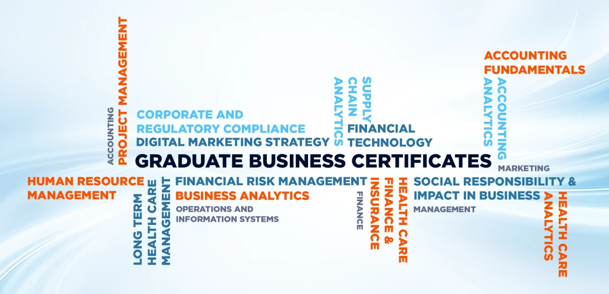 Diverse EMBA students having conversation standing in front of laptops.